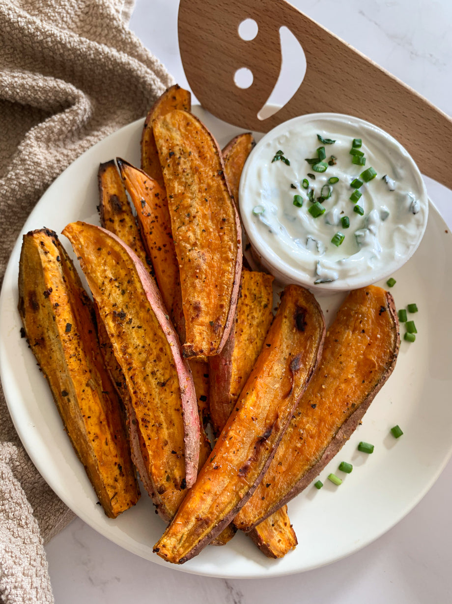 Citrusy Garlic Sweet Potato Wedges with Garlic & Herb Yogurt Dip
