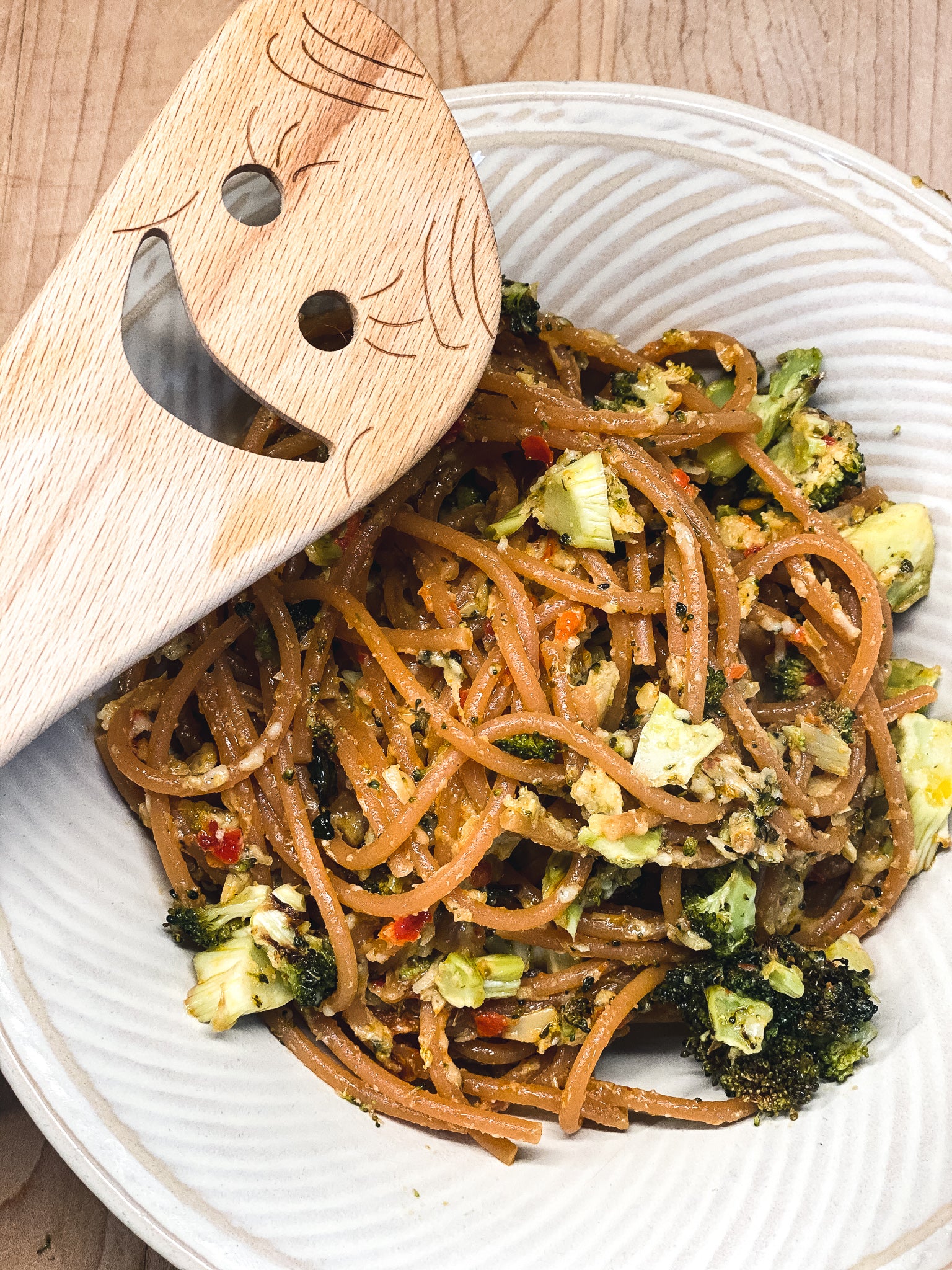 Red Lentil Pasta with Roasted Broccoli in Parmesan Artichoke Antipasto Bomba Sauce