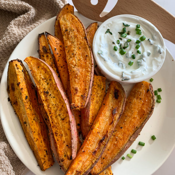 Citrusy Garlic Sweet Potato Wedges with Garlic & Herb Yogurt Dip