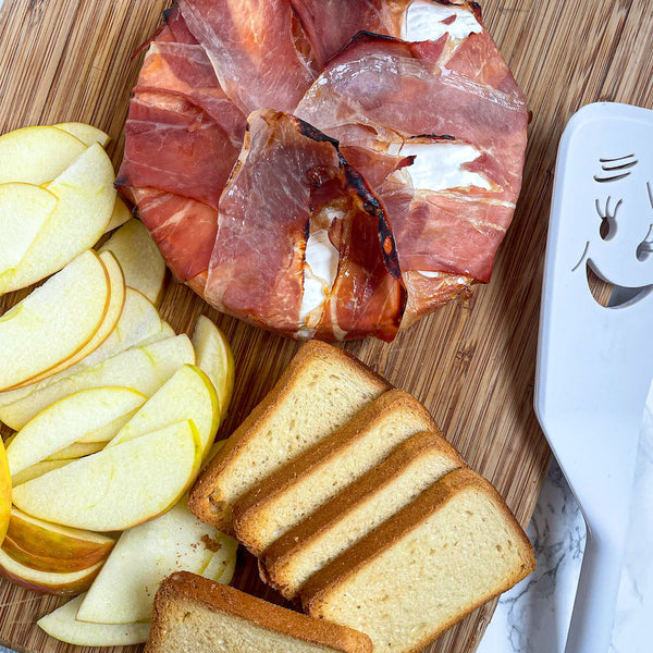 Prosciutto Wrapped Brie with Hot Honey